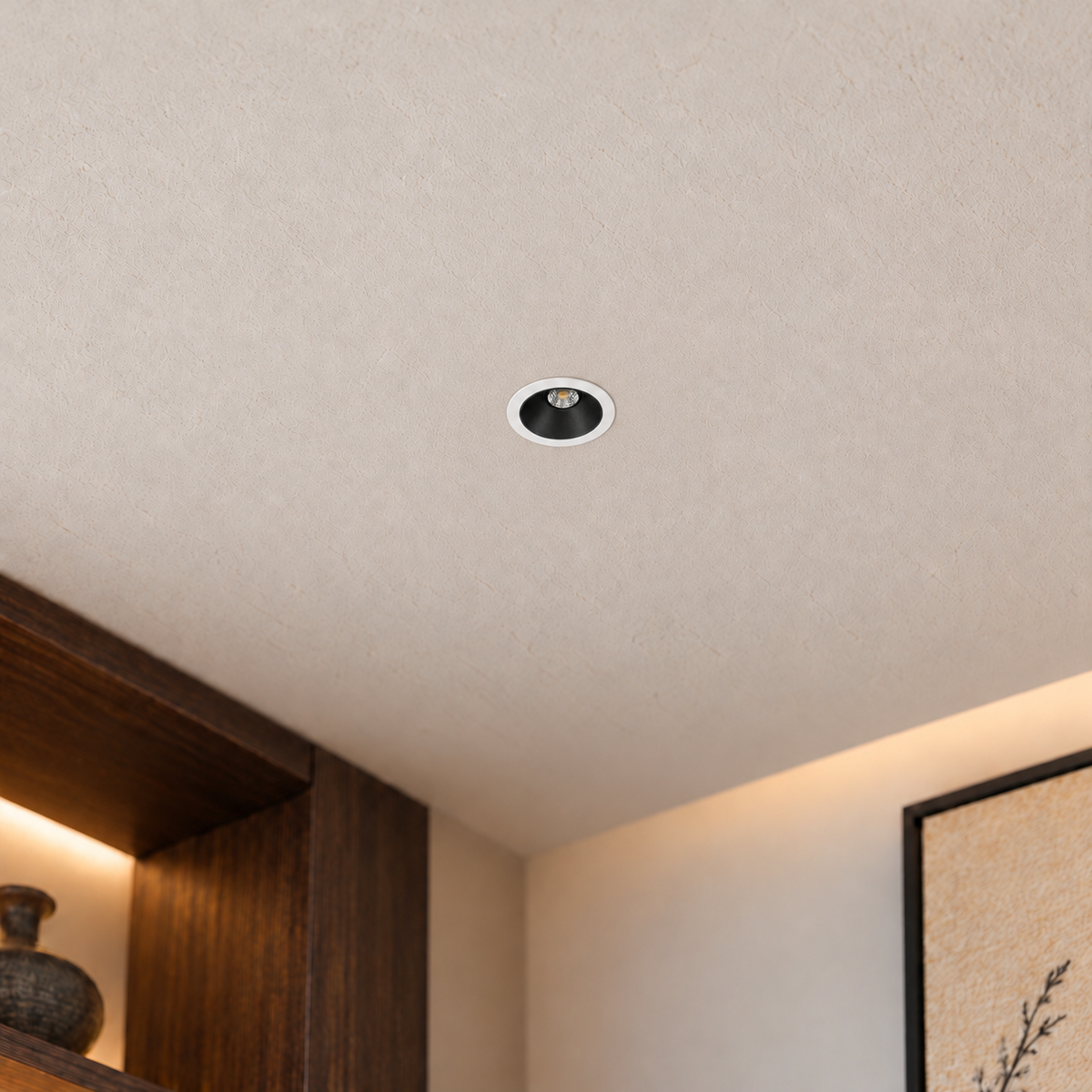 KOYAMA KUME installed ceiling spotlight with compact proportions, white trim and recessed black baffle